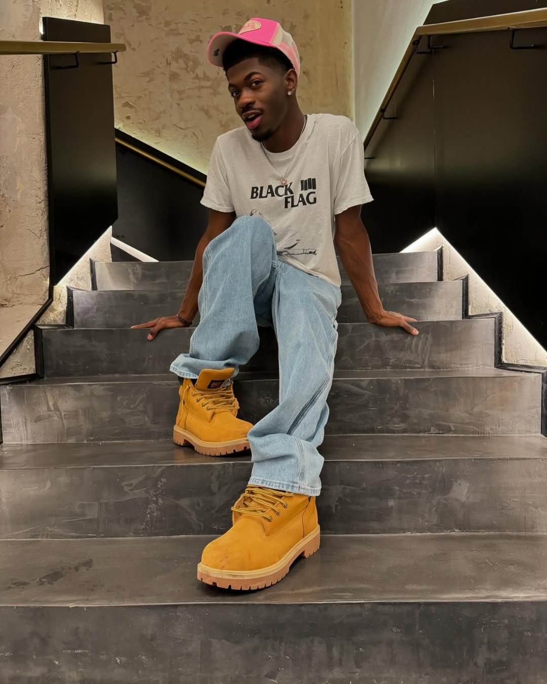 Lil Nas X performing during the Long Live Montero Tour (2022), showcasing his high-production stage design, genre-crossing collaborations, and global live performance appeal.